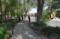 На улицах Астрахани укладывают новый асфальт